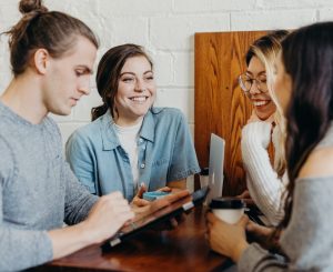 group of young people in a meeting